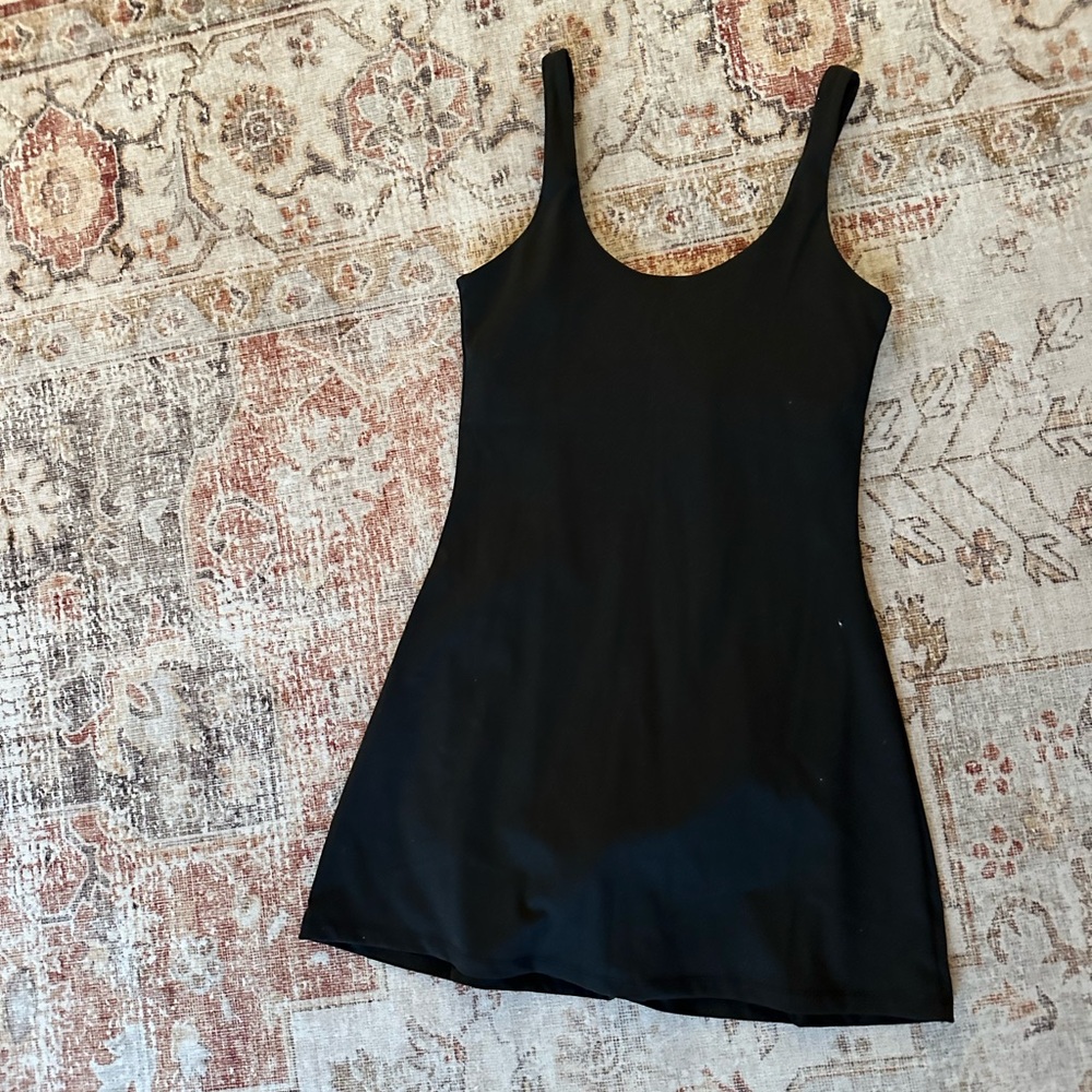 lack tennis dress with pads and built in shorts